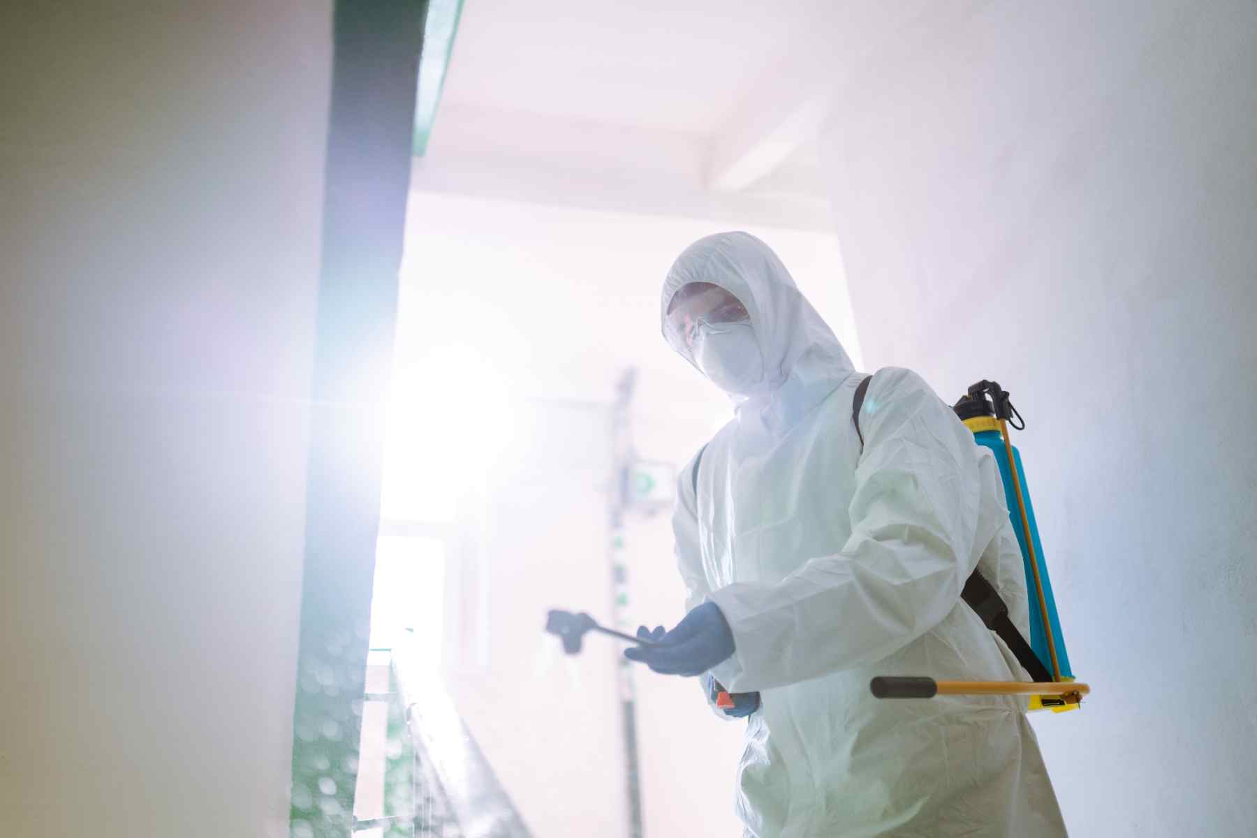 man-in-hazmat-suit-protective-gloves-and-goggles-2026-03-24-08-56-53-utc